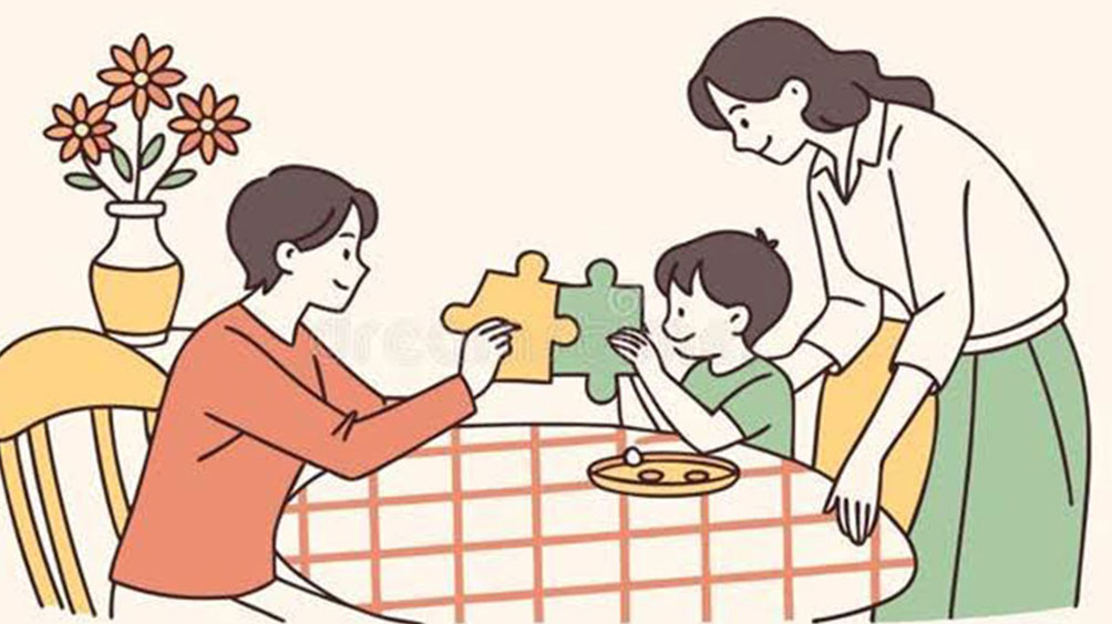 En familie på 3 sidder ved et bord